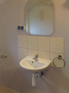 A bathroom at Domek Rybaka