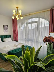 Postel nebo postele na pokoji v ubytování Boutique Hotel Honey