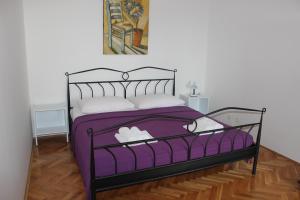 Postel nebo postele na pokoji v ubytování Apartments Petrada