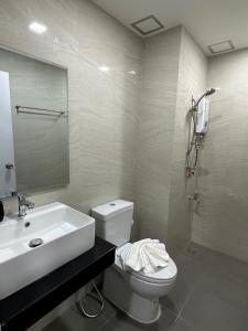 Kylpyhuone majoituspaikassa Aston Residence Hatyai