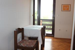 Postel nebo postele na pokoji v ubytování Apartments Petrada