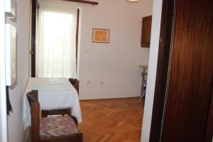 Postel nebo postele na pokoji v ubytování Apartments Petrada