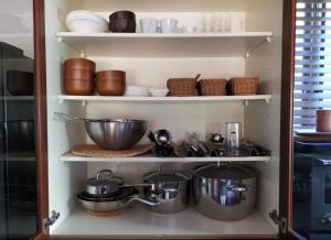 a kitchen pantry with pots and pans on shelves at Ahouse - Vacation STAY 17245v in Takashima
