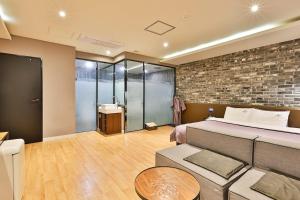 Posezení v ubytování Brown Dot Hotel Jeonggwan