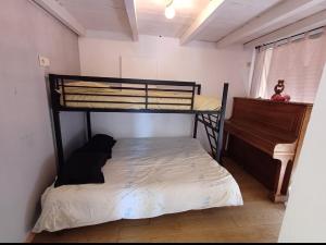Łóżko lub łóżka w pokoju w obiekcie Maison de vacances au cœur de la Cerdagne