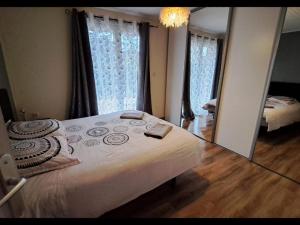 Łóżko lub łóżka w pokoju w obiekcie Maison de vacances au cœur de la Cerdagne