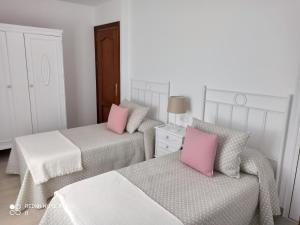Ένα ή περισσότερα κρεβάτια σε δωμάτιο στο Casa La Loma en Archidona +41 φωτογραφίες