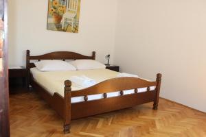 Postel nebo postele na pokoji v ubytování Apartments Petrada