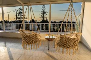 Balkón nebo terasa v ubytování Minodoras Guesthouse