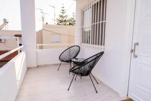 Balkón nebo terasa v ubytování Minodoras Guesthouse