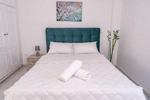 Postel nebo postele na pokoji v ubytování Minodoras Guesthouse