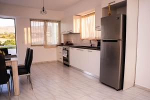 Kuchyň nebo kuchyňský kout v ubytování Minodoras Guesthouse