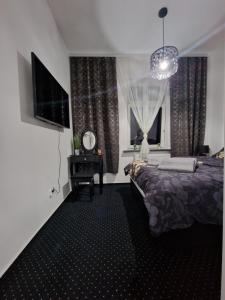 Katil atau katil-katil dalam bilik di MAGIC HOME Apartamenty