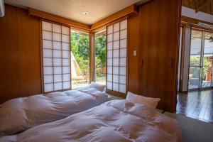 Llit o llits en una habitació de PINECONE BASE