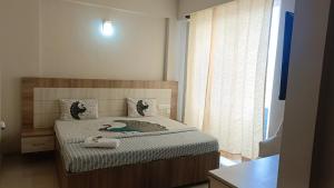 Afbeelding uit fotogalerij van Blue Mans Rooms in Vrindāvan