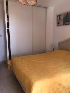 Posteľ alebo postele v izbe v ubytovaní Appartement 60m2 - 2 Chambres à une minute des plages, parking privé