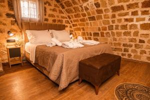Кровать или кровати в номере Inverno Medieval apartment