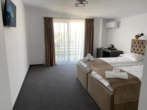 TV a/nebo společenská místnost v ubytování Hotel Maya