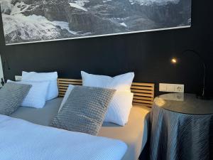 Postel nebo postele na pokoji v ubytování Rein Klassik Hotel