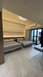 Voodi või voodid majutusasutuse Panda Homestay toas