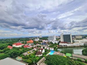 an aerial view of a city with a river and buildings at 2 Bedroom apartment near Chiang mai Night Bazzar in Chiang Mai
