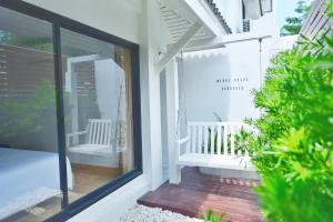 Balkón nebo terasa v ubytování Merry house บ้านพักริมหาดบางแสน