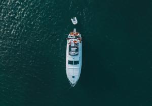 an aerial view of a boat in the water at DiscoverBoat - Pita - Exclusive Boat&Breakfast in Bari