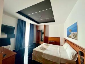 Postel nebo postele na pokoji v ubytování Hotel TEA - Praia a Mare