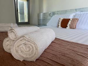 Postel nebo postele na pokoji v ubytování Ca Baruffa B&B
