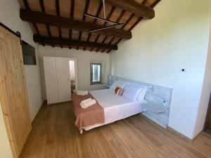 Postel nebo postele na pokoji v ubytování Ca Baruffa B&B