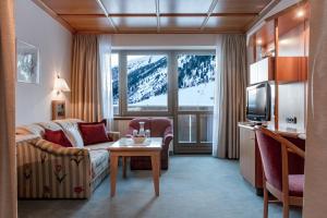 TV a/nebo společenská místnost v ubytování Hotel Alpina deluxe