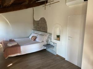 Postel nebo postele na pokoji v ubytování Ca Baruffa B&B