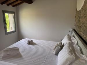 Postel nebo postele na pokoji v ubytování Ca Baruffa B&B