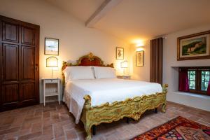 a bedroom with a king sized bed in a room at Villa Carrara Salvadori in Grezzana +51 photos
