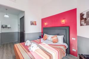 Postel nebo postele na pokoji v ubytování MF Hotel
