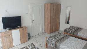 Postel nebo postele na pokoji v ubytování Rooms Enna