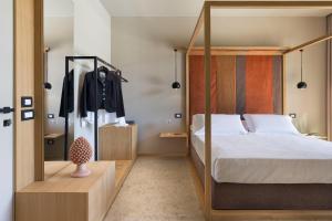 Кровать или кровати в номере Villa Neri Resort & Spa