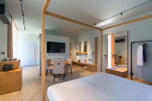 Телевизор и/или развлекательный центр в Villa Neri Resort & Spa