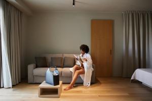 A seating area at Mima Aparthotel Boutique & Spa
