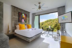Ένα ή περισσότερα κρεβάτια σε δωμάτιο στο Serenity Villa