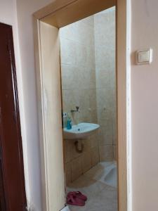 a bathroom with a shower and a sink at hilal in Erzurum