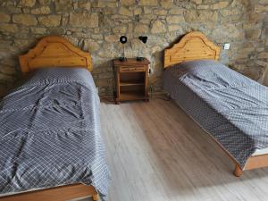 Postel nebo postele na pokoji v ubytování KERHAM