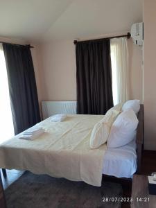 Postel nebo postele na pokoji v ubytování Phudze