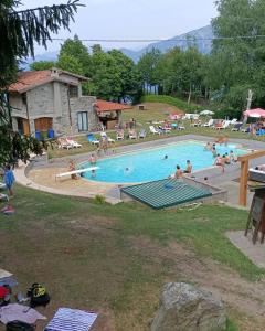 a group of people in a swimming pool at PROVINCIALE 79 in Magreglio