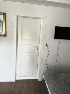 Sjónvarps- og/eða afþreyingartæki á Sunbjerre B&B