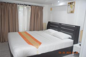 Ένα ή περισσότερα κρεβάτια σε δωμάτιο στο kalim residence 217 vue partielle mer +64 φωτογραφίες