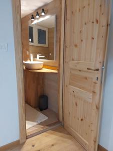 a bathroom with a sink and a mirror at Studio al Mulino in Rovinj