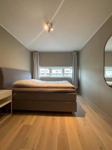 Postel nebo postele na pokoji v ubytování Jonas Apartment
