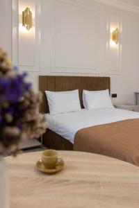 Postel nebo postele na pokoji v ubytování Parvana Guest House