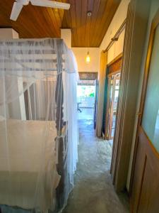 a wedding veil is hanging in a hallway at Calm Retreat in Mirissa